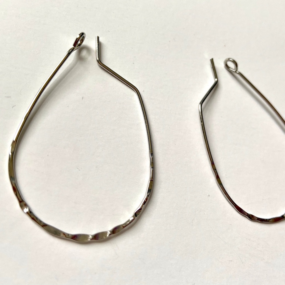 Silver hammered oval hoops by Banana Republic